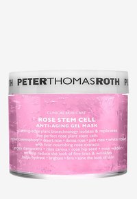 Heldere pot met een roze gelmasker. Bevat productnaam, ingrediënten en voordelen in zwarte tekst op een witte label. Hydraterende formule.