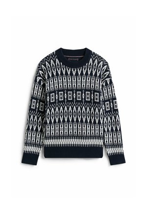 Marineblå strikket sweater med hvide geometriske mønstre, rund hals, lange ærmer og ribbede kanter. Karakteristisk tekstur hele vejen igennem.