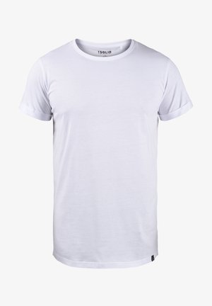 T-shirt blanc à manches courtes fabriqué en tissu doux. Il présente un col rond, des manchons roulés et un logo de marque subtil sur l'ourlet. Design simple.