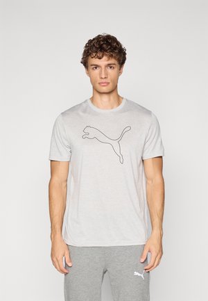 Lichtgrijs katoenen T-shirt met een zwarte omtrek van een springende puma-logo aan de voorkant. Korte mouwen en een ronde hals.