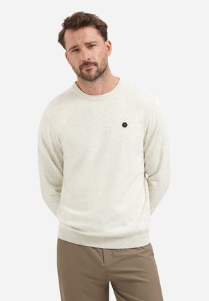 Light gray knitted sweater with a round neck and ribbed cuffs, featuring a small black hexagon logo on the left chest. Observable texture.