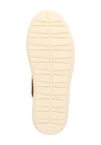 Strukturierte Gummisohle in Cremefarbe mit einem gemusterten Grip. Verfügt über Details entlang der Kanten und ein Präge-Logo nahe der Ferse.