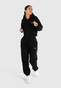 Smilodox Felpa con zip - schwarz