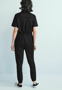 Next Overal - black