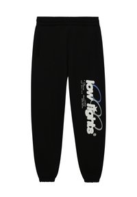 Svarta mjukisbyxor med resår i midjan och i bensluten, med sidofickor och kraftig vit och blå grafisk text på ena benet.