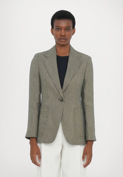Blazer cu carouri houndstooth în negru și alb șters, închidere cu un singur nasture, rever de tip notch și două buzunare frontale, cu croială ajustată și țesătură texturată.