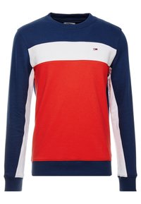 Mörkblå, röd och vit crewneck sweatshirt med färgblockdesign. Mjuk bomullsmaterial, ribbade ärmslut och nederkant, liten logotyp på bröstet.