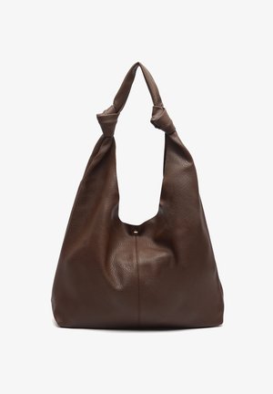 Brown leather hobo bag with a soft texture, large opening, knot-style handles, and a subtle seam detail at the bottom.