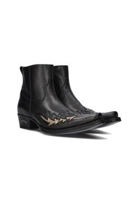 Zwarte leren enkellaarsjes met spitse neuzen, voorzien van hoekige gouden stiksels en een lage hak. Glad materiaal met decoratieve accenten.