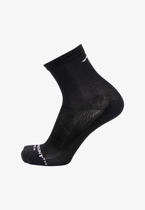 Schwarze Knöchelsocke mit geripptem Bündchen, glatter Textur, verstärkter Ferse und Spitze, mit weißem Logo-Schriftzug an der Seite.