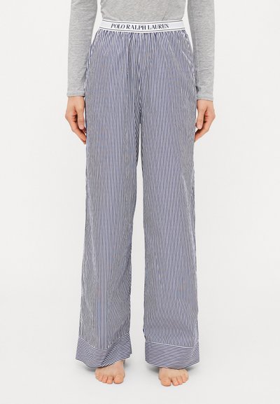 Pyžamové kalhoty ve světle modré barvě s bílými pruhy, se strečovým pasem a logem "POLO RALPH LAUREN", širokým střihem.