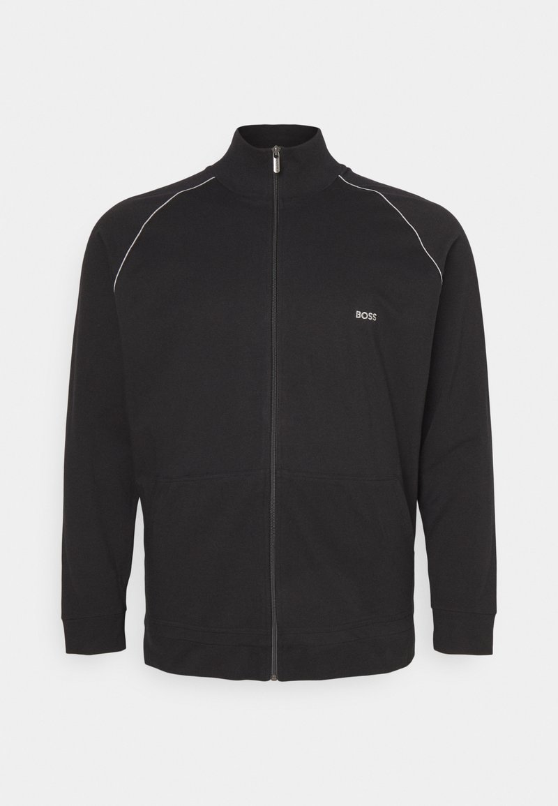 Veste zippée noire en coton, dotée d'un col haut, de manches longues et d'un piping blanc le long des épaules. Comprend un détail de logo.