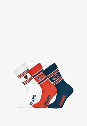 Three pairs of crew socks in white, red, and navy. Each features striped patterns and team logos, with "BEARS" printed on the sole.