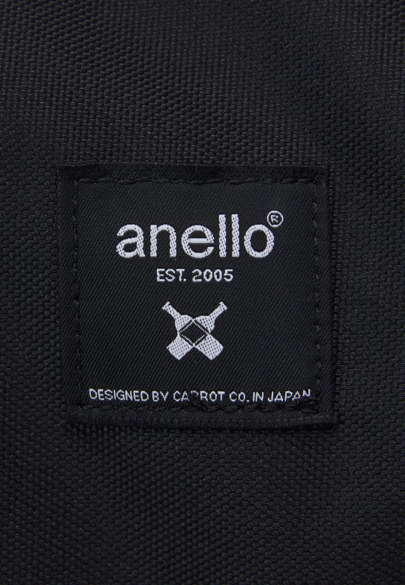 Herren Umhängetaschen | anello REPREVE CROSS BOTTLE UNISEX Tagesrucksack black/schwarz - MT49586 Herren Umhängetaschen | anello REPREVE CROSS BOTTLE UNISEX Tagesrucksack black/schwarz - MT49586