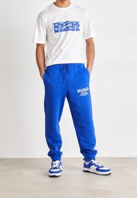 HUGO Träningsbyxor - blue