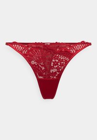 Rød blonde tanga med blomsterdesign, med en myk stoffelastikk i livet og minimal dekning bak; gjennomsiktig nettøvre med dekorative detaljer.