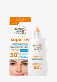 SUNSCREEN FLUID WITH SPF 50+ - Protection solaire