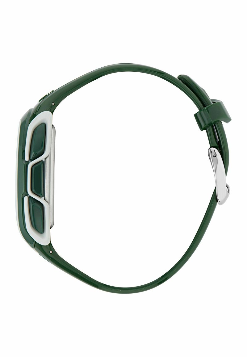 Reloj de goma verde con una caja rectangular blanca y plateada. Presenta dos recortes rectangulares, una textura lisa y un cierre metálico.