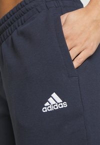 adidas Sportswear ESSENTIALS LINEAR CUFFED - Træningsbukser - legend ink