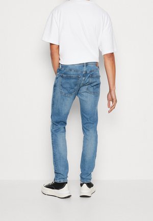 Vaqueros tapered - blue denim
