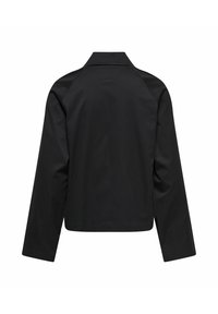 Veste noire à manches longues avec une coupe droite, un col et des coutures arrière visibles, vue de dos sur un fond blanc.