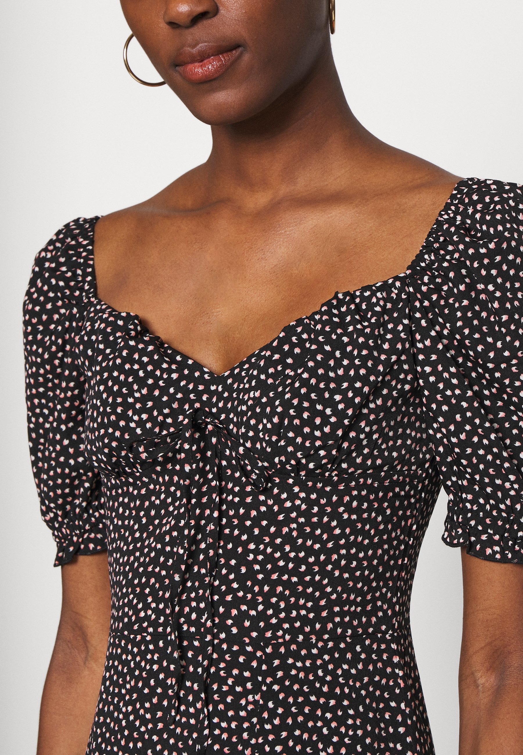 curved hem midi wrap dress