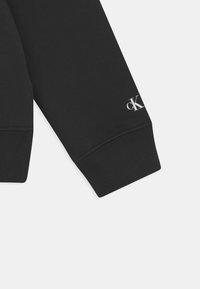 Calvin Klein Jeans Jersey con capucha - black