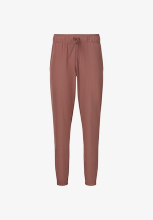 Joggers doux, légers et fuselés dans une couleur rose poussiéreux. Comprend une taille élastique avec cordon de serrage et des poignets élastiques aux chevilles.