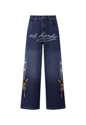 Denim wide-leg jeans in dark blue with 'ed hardy' logo in white and decorative graphic design featuring a heart and dagger in colors.