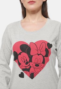 Gray long-sleeve shirt featuring a large red heart graphic with black outlines of two cartoon mice, one with a bow, surrounded by small black hearts.
