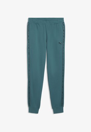 Puma joggingbroek in petrolkleurige stof met elastische tailleband, voorzien van zwarte zijstrepen en taps toelopende boorden. Eenvoudig ontwerp en gladde textuur.