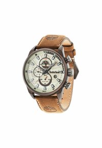 Reloj Timberland con correa de cuero marrón, esfera crema, acentos plateados y características de cronógrafo, mostrando la hora dual y un logotipo de árbol.