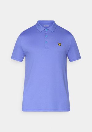 Fialová polokošeľa vyrobená z hladkej látky, s placketou na tri gombíky a malým žltým vyšívaným logom na hrudi. Krátke rukávy.