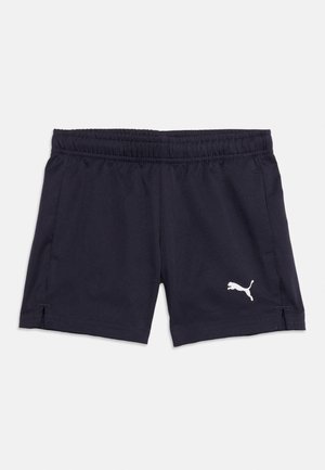 Pantalones cortos deportivos azul marino con cintura elástica y logotipo blanco de Puma en el lado inferior izquierdo, colocados planos sobre un fondo claro.