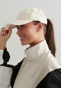 aim’n® Cappellino - beige