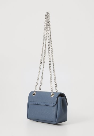Blue leather handbag with a textured finish. Features a structured shape, silver chain straps, and a flap closure.