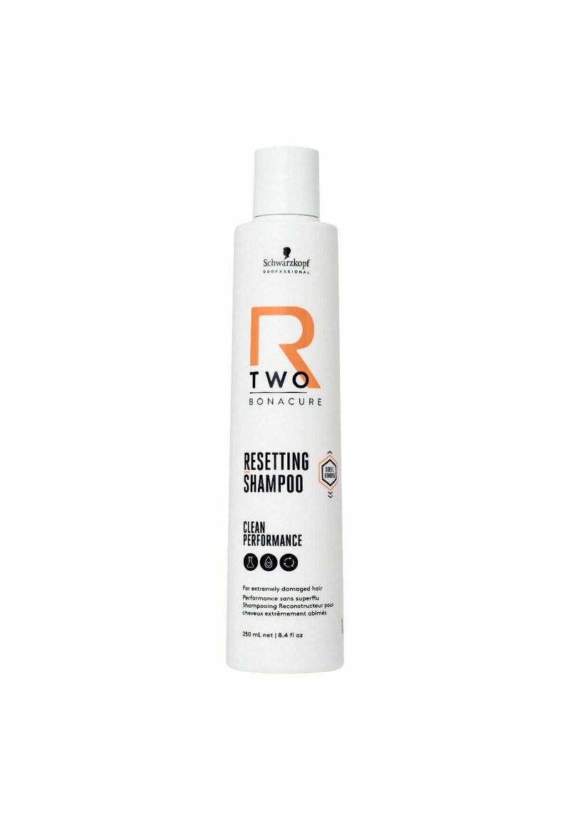 Witte fles van Schwarzkopf R2 Bonacure Resetting Shampoo, met een oranje logo en zwarte tekst, met een gladde matte afwerking. 250 mL.