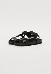 Love Moschino Kotníkové sandály  - black