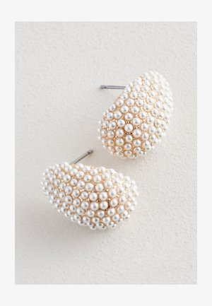 Gold-tone earrings featuring a textured design covered with small white pearls, shaped like puffy ovals, with metal posts for fastening.