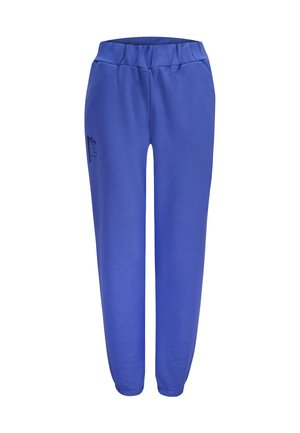 Blaue Sweatpants aus weichem Stoff, mit einem elastischen Bund, schmal zulaufenden Beinen und einem kleinen schwarzen Logo auf der linken Seite.