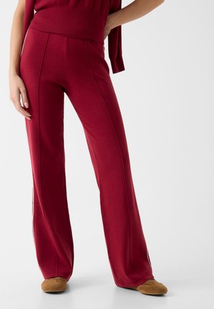 AUSGESTELLTE - Pantalon de survêtement - rot