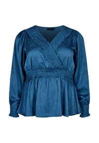 Blouse bleu sarcelle avec un design croisé, manches longues bouffantes, tissu texturé et taille froncée pour un look ajusté.