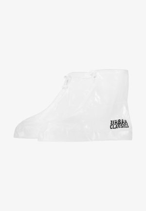 Căști de pantofi waterproof transparente, cu o textură netedă, design adaptat și un logo negru "URBAN CLASSICS" pe lateral.