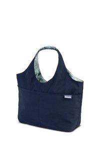 Navyblauwe stoffen draagtasje met een groot voorvak, gebogen handvatten en een interieurbekleding met bloemenpatroon. Bevat een klein merklabel.