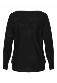 Melnā adīta džemperis ar brīvu piegriezumu, platu kakla izgriezumu un garām piedurknēm. Audums izskatās mīksts un nedaudz caurspīdīgs. Šuvju detaļas ir minimālas.