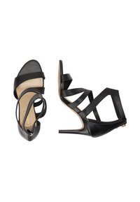 Zwarte hoge hakken sandalen met meerdere kruissnaren, glad leer, puntige neus en slanke stilettohak. Details met achterrits.