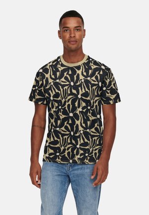 Short-sleeve t-shirt in dark green with black floral pattern and white accents. Made from soft fabric, featuring a round neckline and relaxed fit.