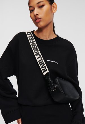 CIRCLE - Cross body bag - black