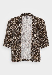 Veste à manches courtes à imprimé léopard fabriquée en tissu doux et texturé. Ouverture devant sans fermeture et un motif intérieur contrastant dans des tons clairs.