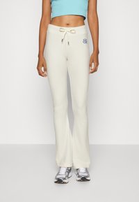 Juicy Couture TRACK PANTS WITH BUBBLE GRAPHIC - Tréningruha alsók - sugar swizzle